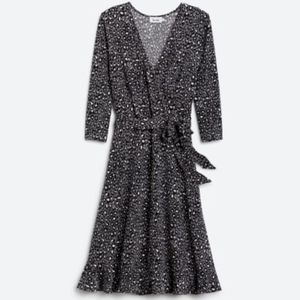 Leopard print faux wrap dress with ruffle hem